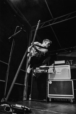 Bassist Jumping in Black and White Sandberg Bass