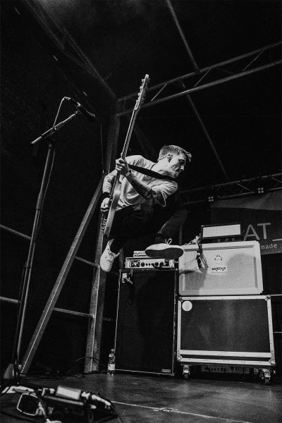 Bassist Jumping in Black and White Sandberg Bass