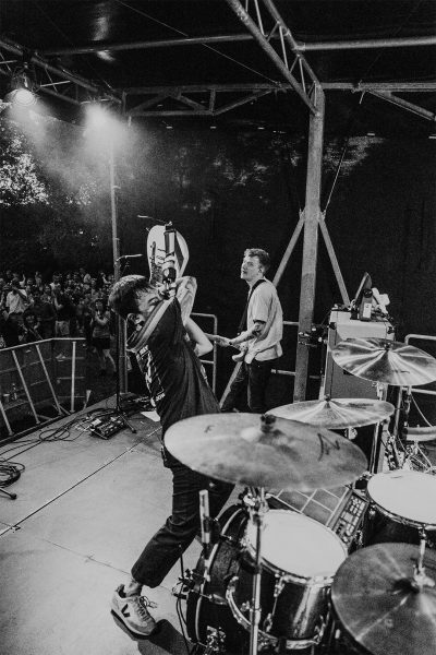 Guitarist with liftet guitar black and white