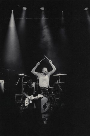 Drummer with Lifted Arms Black and white