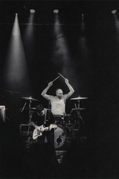 Drummer with Lifted Arms Black and white